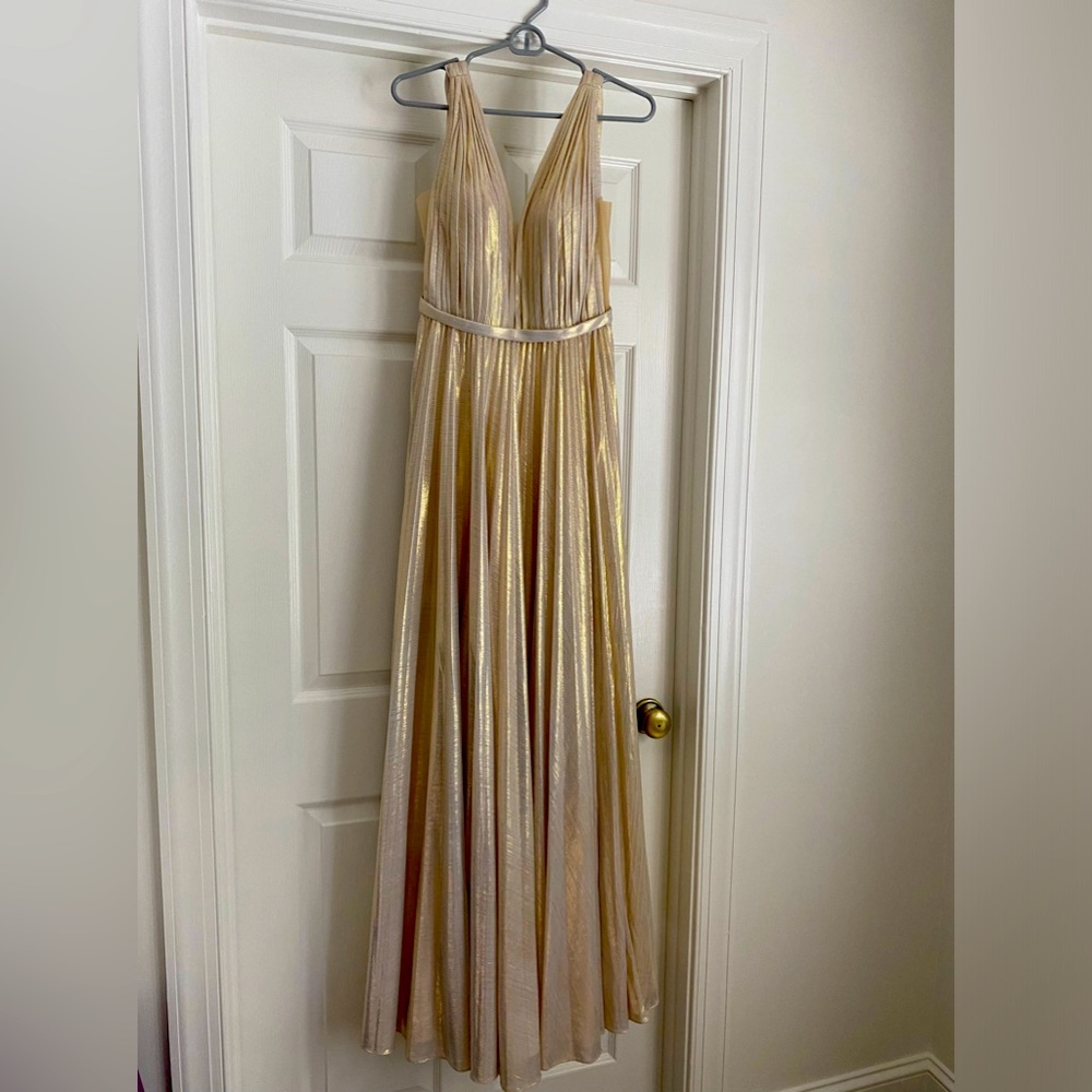 New without tags! Cinderella Divine Gold side slit dress.